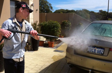 cam cleaning car outside